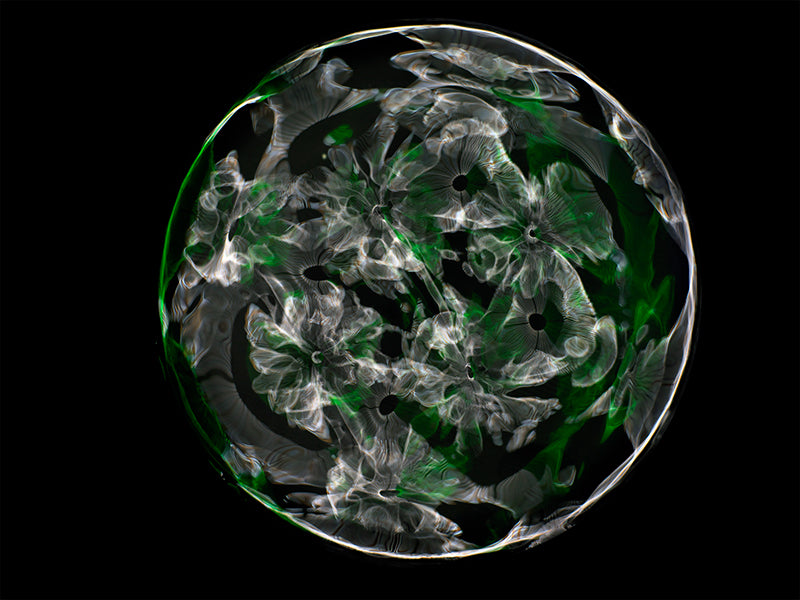 Underwater study held underwater with surface ripples and hushed light