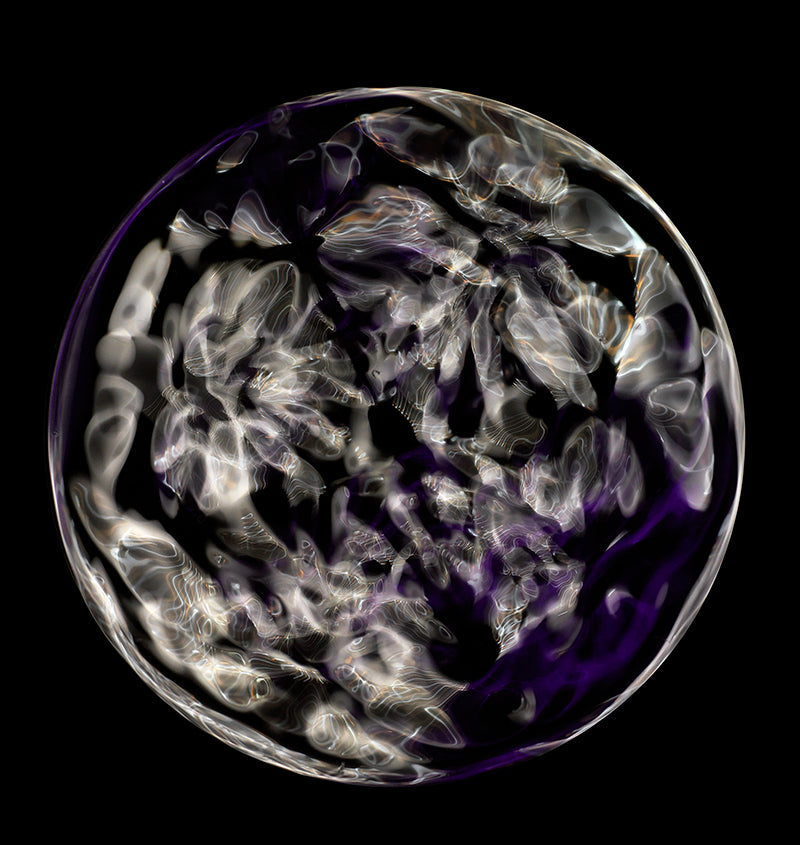 Underwater quiet still life composed with surface ripples and gravitational in hushed light