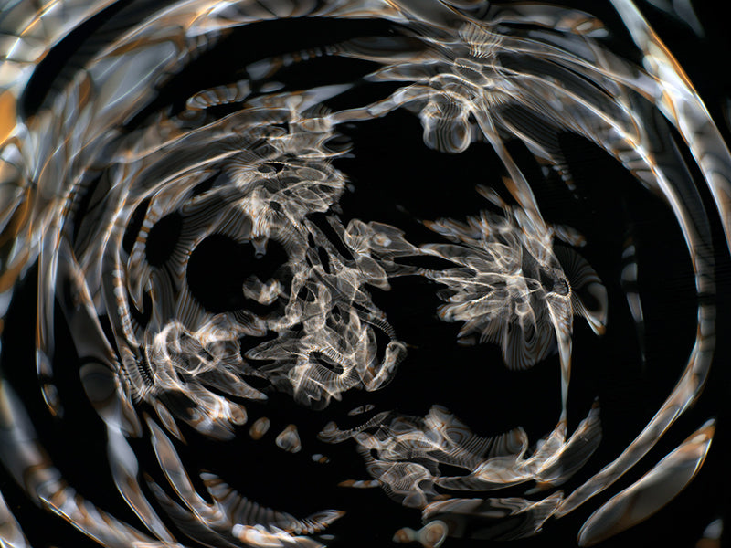 Underwater underwater study composed with surface ripples in silver light