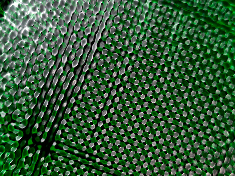 Underwater wave nodes with concentric rings set in clear light