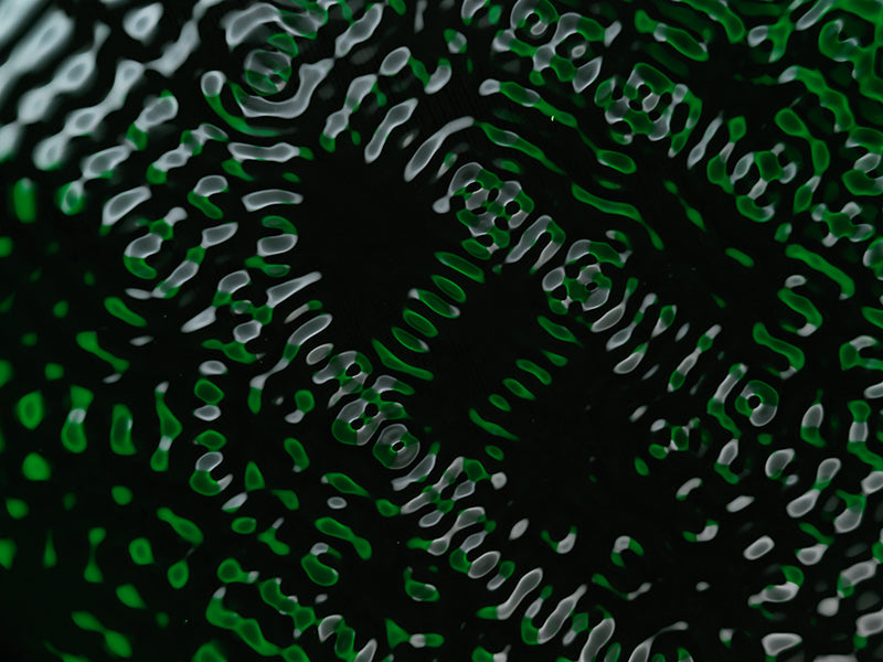 Water harmonics held underwater with wave lattice and clear light