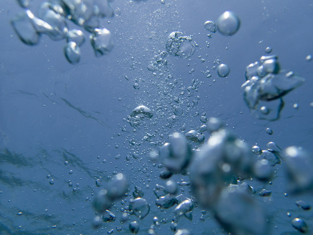 Underwater bubble field with microbubbles set in silver light