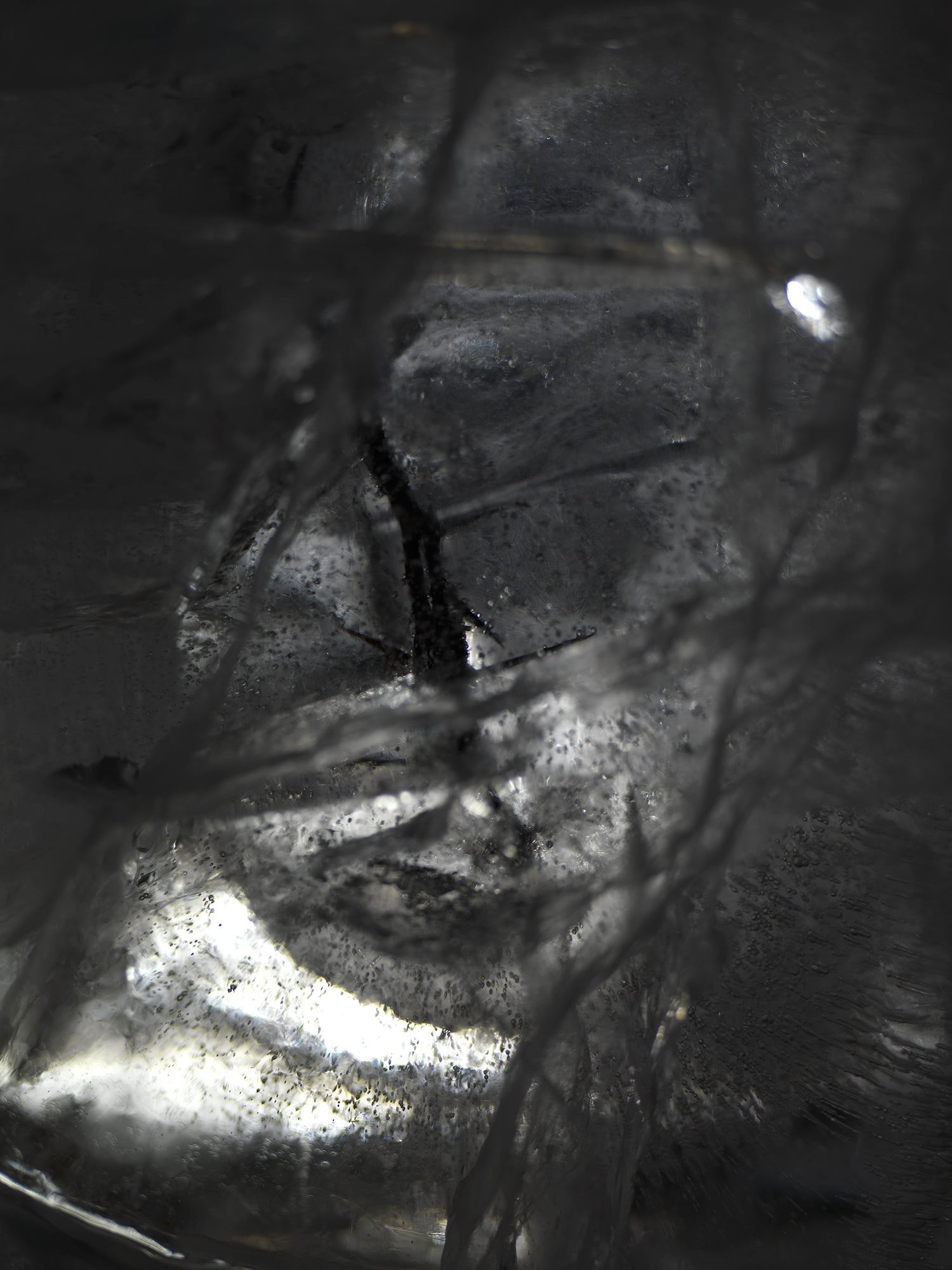 Water film held underwater with swirling film and crude and soft light