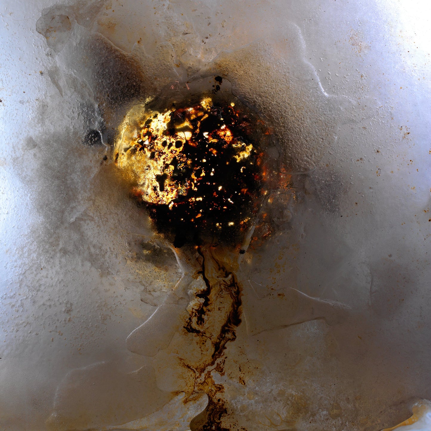 Water film underwater in soft light with swirling film and crude