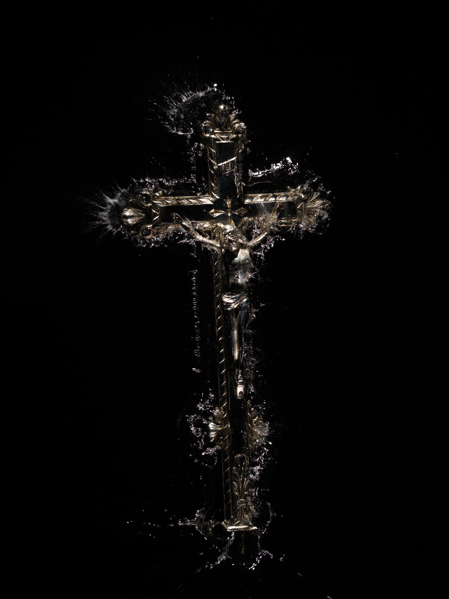 A quiet crucifixion in the dark water
