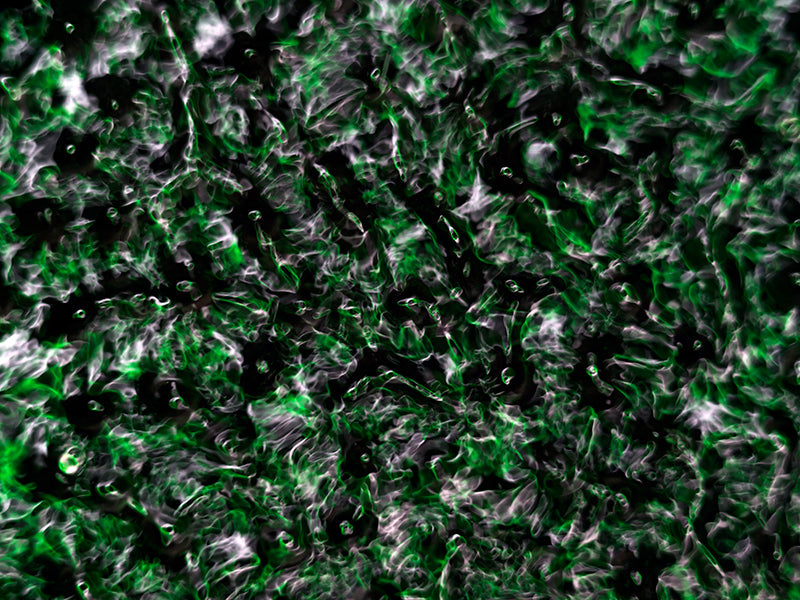 Water harmonics drifting underwater with concentric rings in pale light
